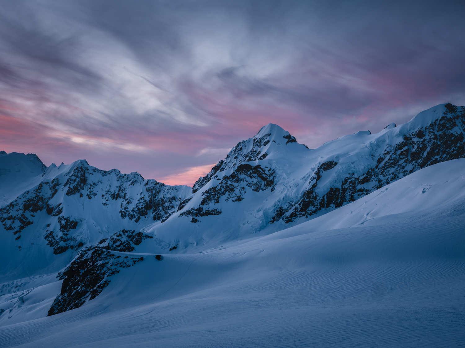 Snow covered mountains at dusk, outdoor photography by Kat Prochazka
