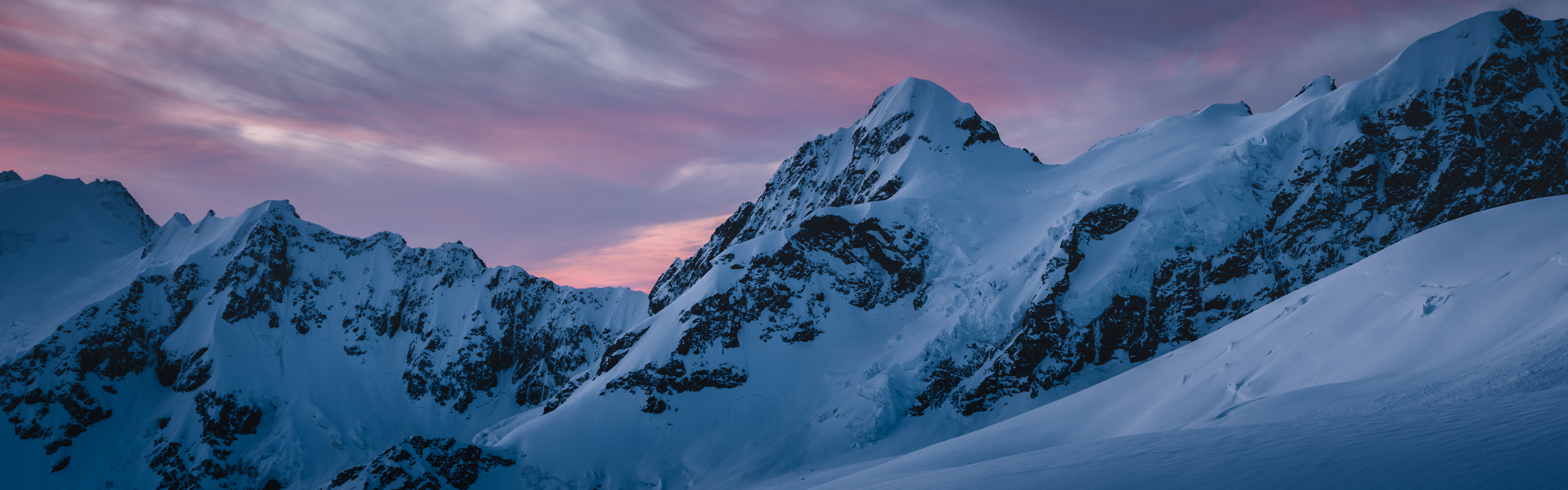 Snow covered mountains at dusk, outdoor photography by Kat Prochazka